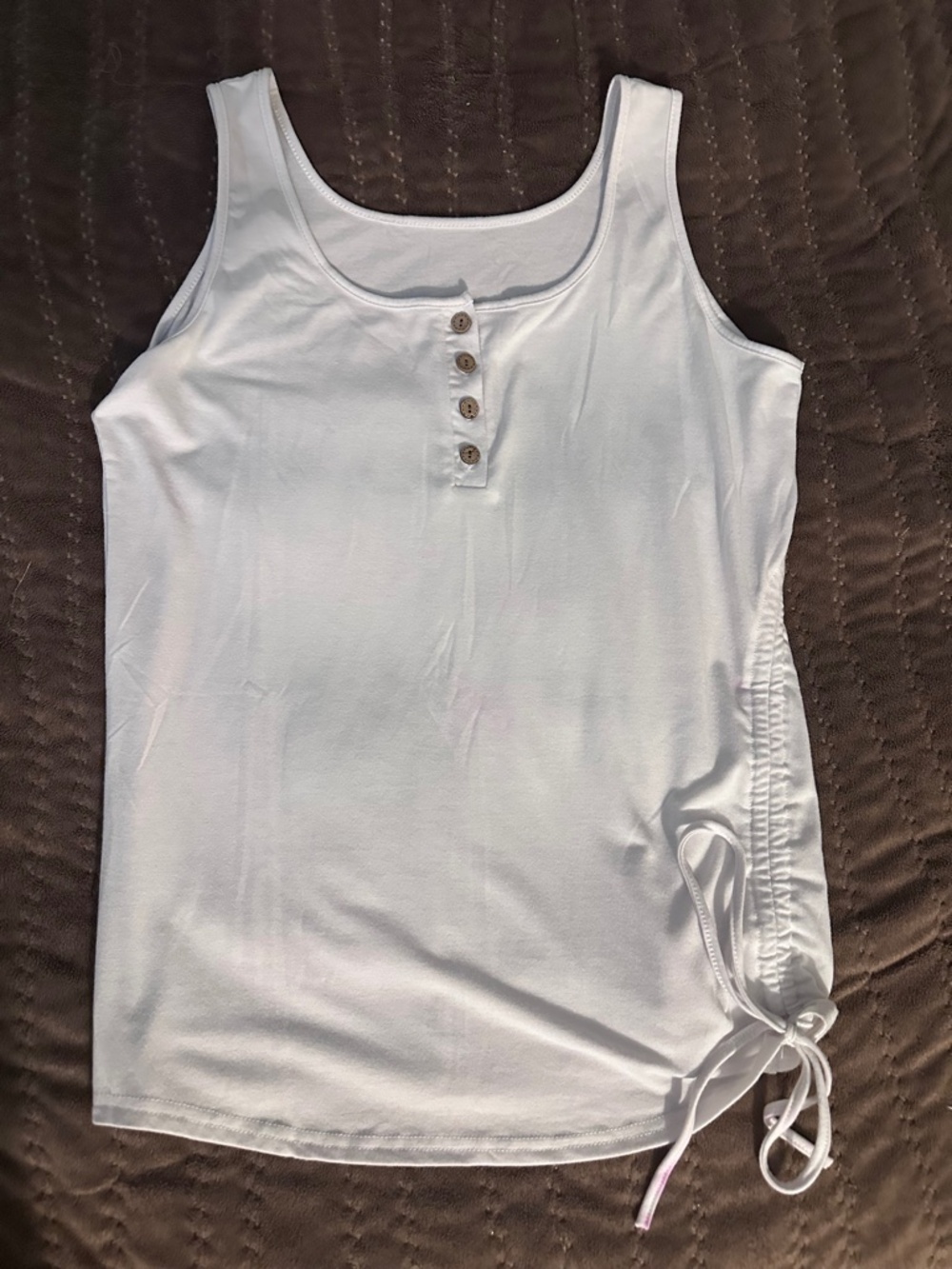 White sleeveless top with side tie.  Size M